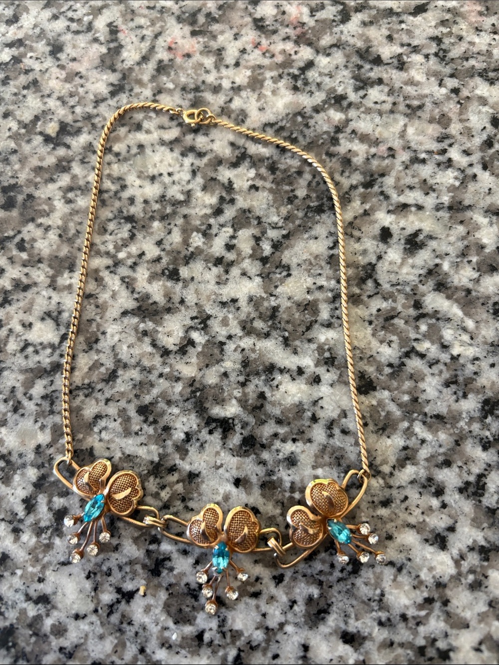 Gold-Tone Floral Necklace with Blue Crystal Accents